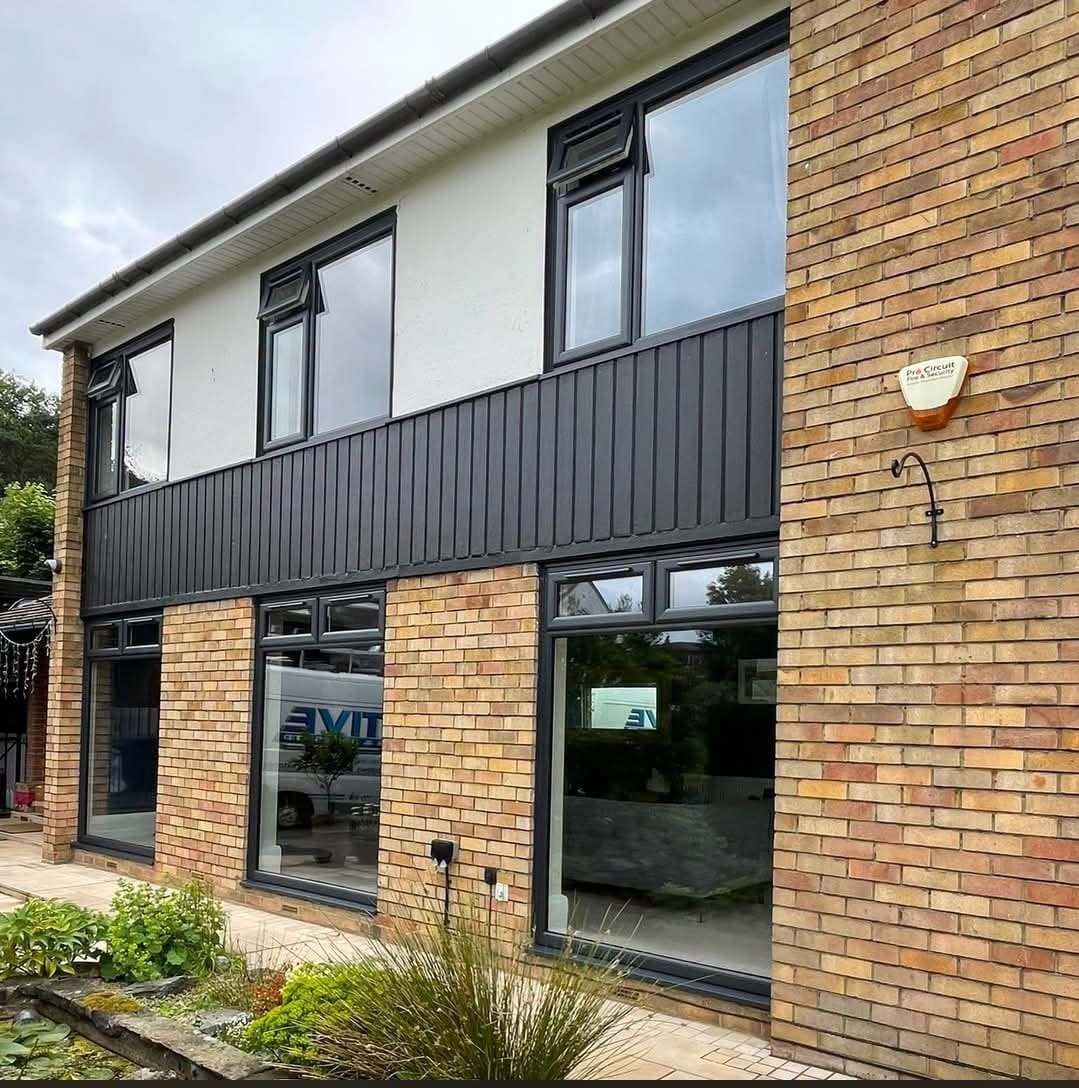 House exterior with dark-framed windows and doors in Portlaoise, Laois | Farrell Exteriors