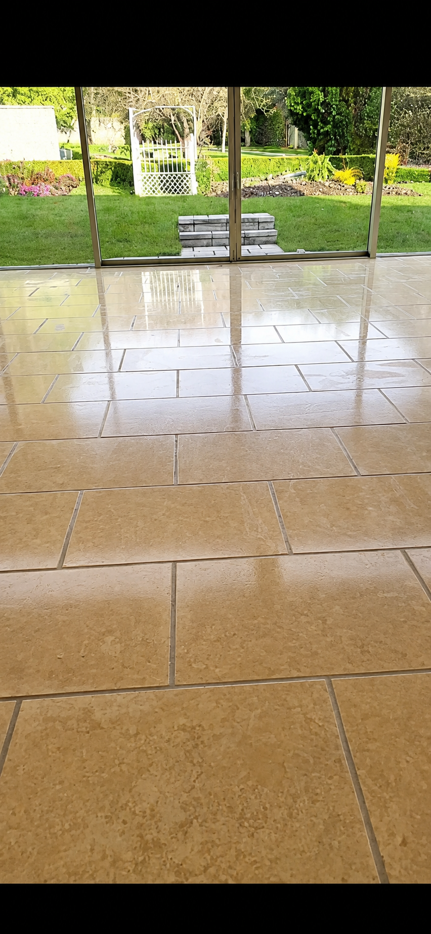 Porcelain paving project in Laois beside French doors | Farrell Exteriors